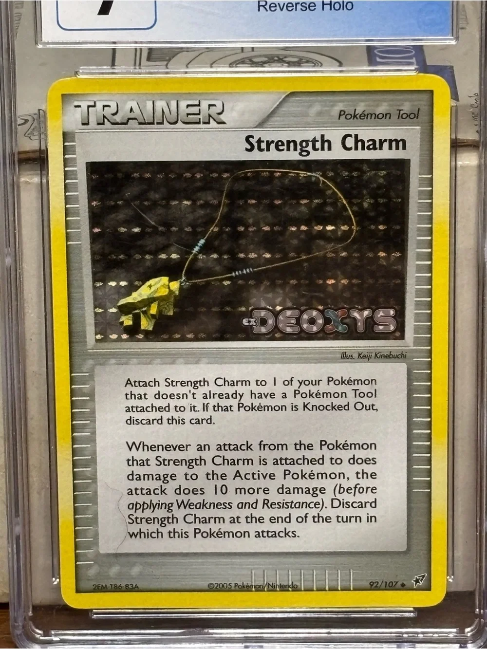Strength Charm 92/107 Deoxys Reverse Holo Stamped CGC 9 Pokemon Card